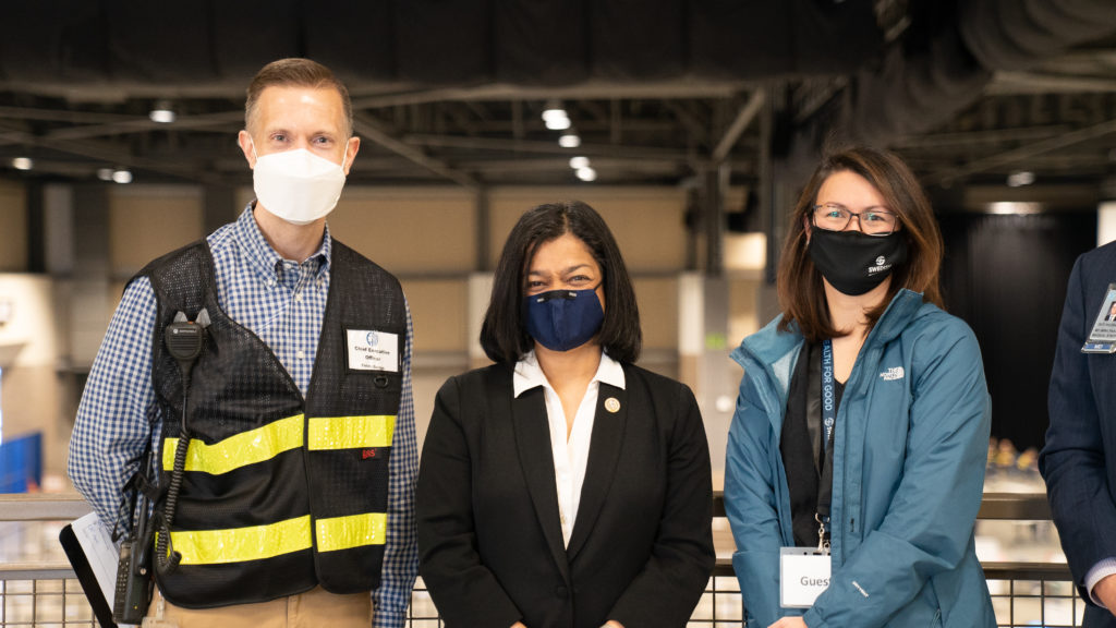 From left to right: Calvin W. Goings, FAS Director and CEO of the Community Vaccination Site, with Congresswoman Pramila Jayapal and Swedish Chief Quality Officer Renee Rassilyer-Bomers.